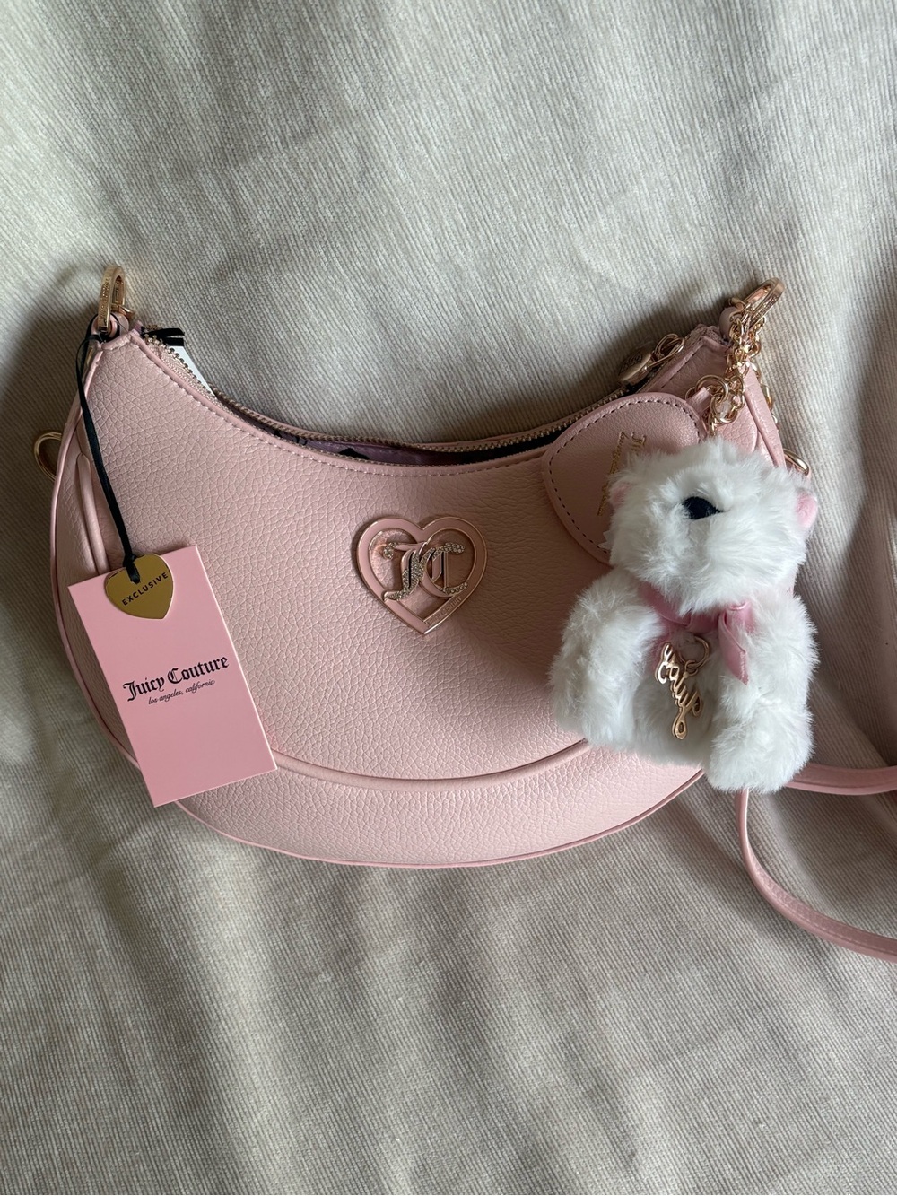 Juicy Couture Light Pink Crescent Crossbody Bag with Dog Charm